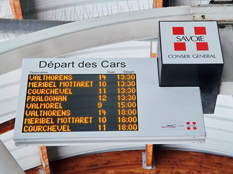 Departure boards showing bus times to Val Thorens