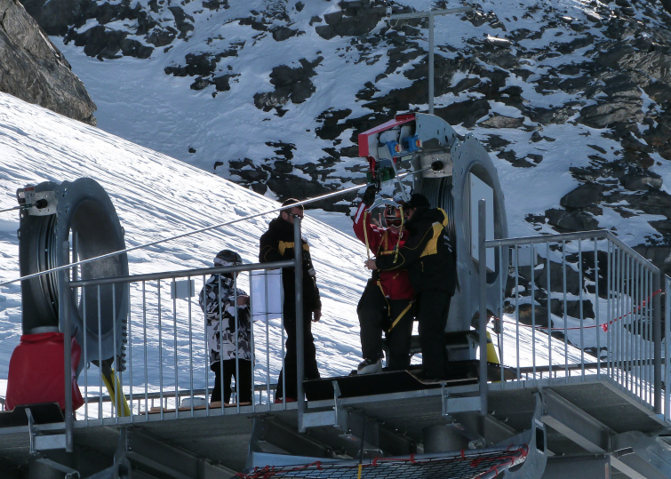 Strapping in to the zip wire in Val Thorens